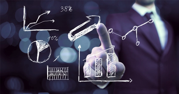 Pessoa analisando gráficos e indicadores de métricas de Meta ADS para melhorar a performance das campanhas